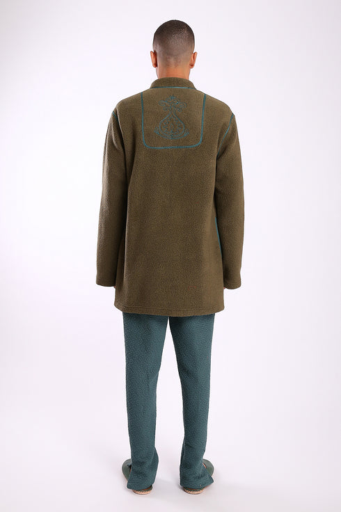 Jacket in faux fur with embroidery on the back